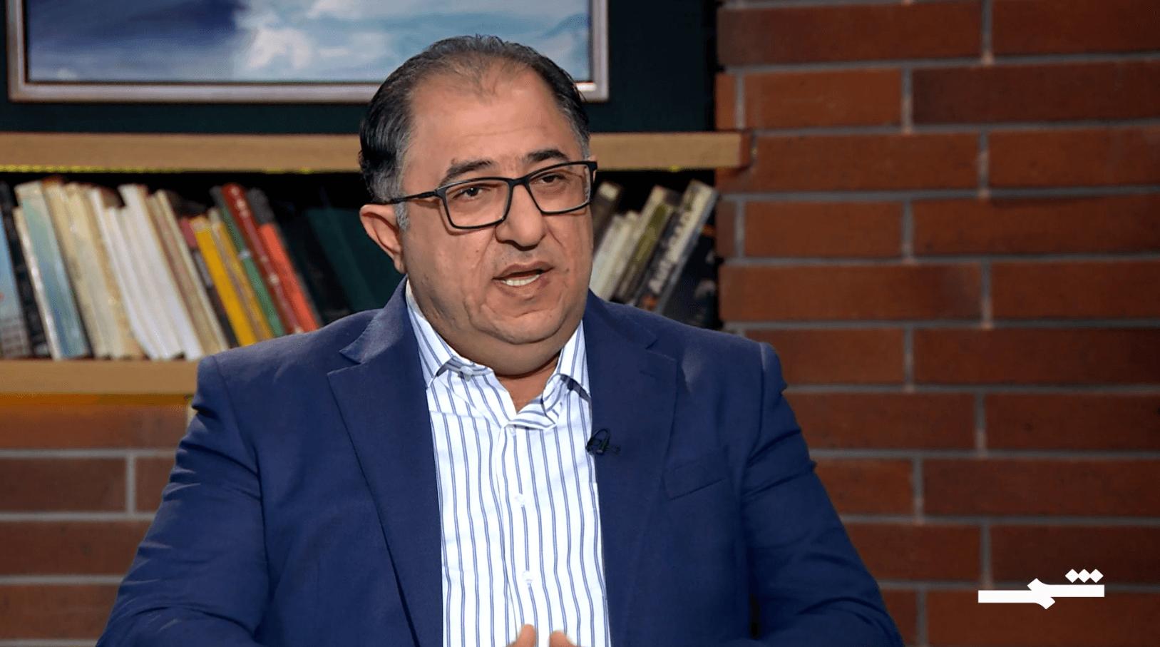 وجوه مع جان دوست | لقاء مع الروائي والناقد هيثم حسين